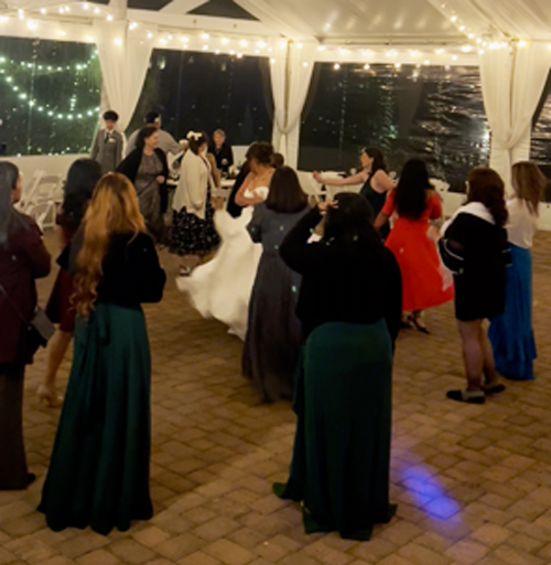Packed wedding dance floor at Philip and Lhaiza’s reception at The Oaks at Salem in Apex, North Carolina.